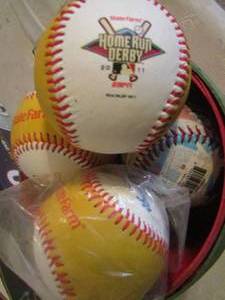 lot 253 image: Red wood basket full of baseballs - 2011 HOME RUN DERBY