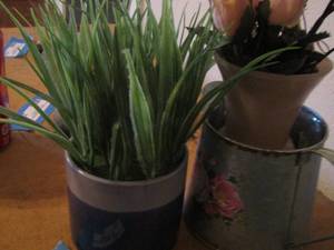 lot 277 image: Pink floral handled pitcher with pink wax flowers, blue jar with greenery for dcor