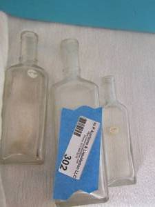 lot 302 image: VINTAGE Glass bottles   QTY 3