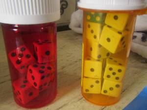 lot 307 image: Medicine bottles of dice qty 2