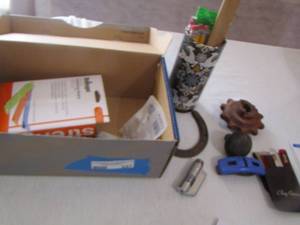 lot 327 image: Oleg Cassini comb & file- horse shoe,  lighter- strength training loops