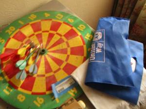 lot 351 image: Dart board with darts and a hand towel