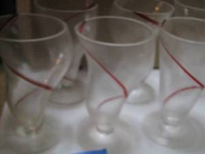 lot 378 image: Drinking glasses have red swirl all around  qty 8