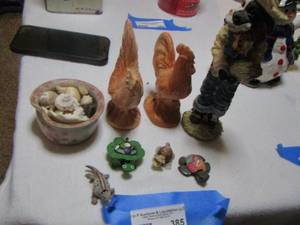 lot 385 image: Rooster figurines X 2 , Cow holding wheat figurine, turtles, sea shells