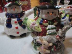 lot 386 image: girl and boy snowman tea pots qty 2
