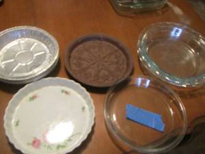 lot 441 image: Aluminum disposable pie plate, pink rose pie, heart stone shortbread mold, Pyrex pie plates