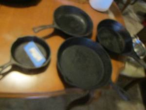 lot 443 image: 9 Wagoner cast iron ,  metal national #2 well used skillet, 10 cast iron skillet,