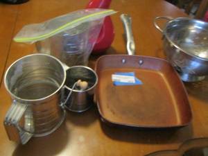 lot 452 image: 2 qt colander, 3 flour sifters, square chef skillet, oil dispenser
