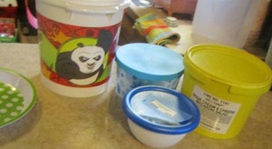 lot 468 image: Green polka dot tray, panda bucket and tubs with lids