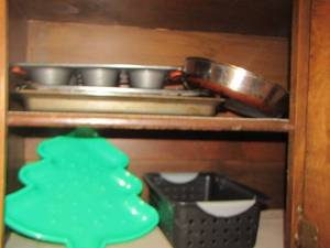 lot 488 image: muffin pans, skillet, green Christmas tree platter
