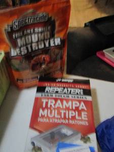 lot 496 image: open bag of fire ant shield,   JT Baton  rodent trap