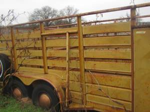 lot 541 image: Livestock trailer, , will need tires to pull away, or can be put on a trailer,  - LENGTH 16 ft.