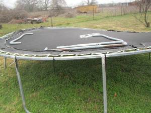 lot 543 image: Trampoline needs repair or could be scrapped, all pieces appear to be there