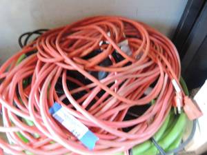 lot 619 image: green water hose- extension cords