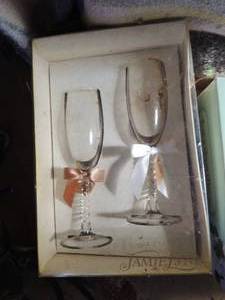 lot 681 image: Bride and Groom cake topper and champagne glasses