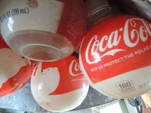 lot 689 image: Mini Vintage Coca-Cola plastic mini bottles 4