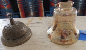 lot 580 image: Glass Liberty Bell bank has pennies-  & Brass  counter bell
