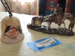 lot 579 image: ceramic bell- Indian adobe house- resin Indian on horse dragging swing