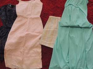 lot 587 image: Vintage girl and women clothing- dresses- pants- shirts