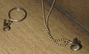 lot 751 image: CHEER LEADER MEGAHORN RING AND NECKLACE SILVER