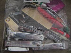 lot 739 image: ZIPLOCK FULL OF FINGER NAIL CLIPPERS, FILES, SMALL FLASH LIGHTS, MINI SCREW DRIVERS AND MORE