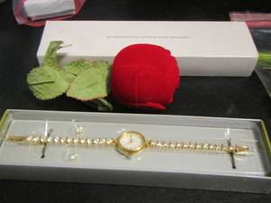 lot 808 image: AVON ROSE JEWELRY HOLDER WITH FRESH WATER PEARL STUD EARRINGS, AVON RHINESTONE TENNIS BRACELET WITH EARRING SET