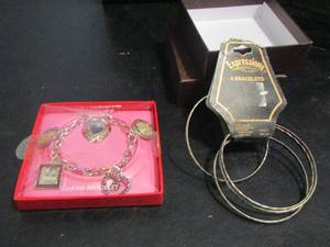 lot 820 image: LIZ CLAIBORNE PICTURE CHARM BRACELET,  & 4 BANGLE BRACELETS