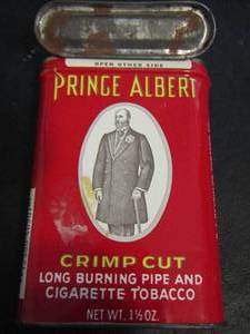 lot 822 image: PRINCE ALBERT CRIMP CUT LONG BURNING PIPE AND CIGARETTE TOBACCO TIN W  BULL DURHAM TOBACCO IN BAG W PAPERS