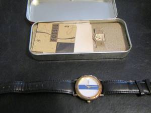 lot 877 image: GENUINE FOSSIL WORLDWIDE AUTHENTIC WATCH