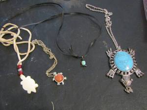 lot 829 image: TURTLE NECKLACES