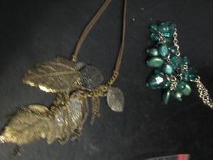 lot 882 image: JUSTINE LEAF NECKLACE, GREEN JEWELED NECKLACE