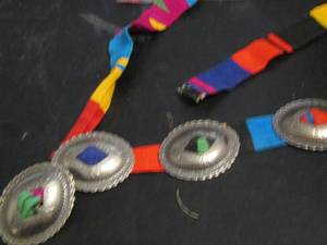 lot 834 image: MULTICOLOR FABRIC BELT WITH CONCHES