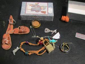 lot 838 image: SANDAL KEY CHAIN, POCAHANAS NECKLACE, RING