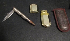 lot 778 image: BULLET KNIFE AND A ZIPPO LIGHTER