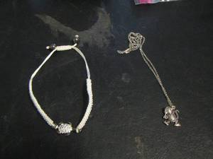 lot 787 image: MONKEY NECKLACE, TURTLE WHITE BRACELET