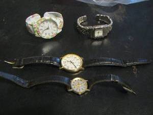 lot 793 image: 2 BLACK  WATCHES - TIMEX  2 BRACELET WOMENS WATCHES - GENEVA , STUDIO ( FLORAL)