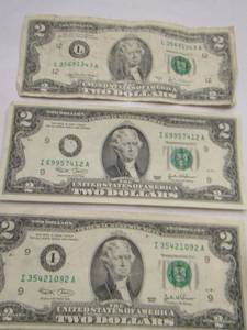 lot 899 image: $2 BILLS - SERIES 1995 X1, 2002 X 3 2013 X 4  QTY 4 -   8 BILLS TOTAL   X $$