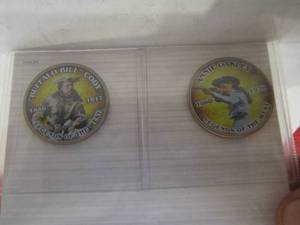lot 929 image: WILD WEST COINS - ANNIE OAKLEY  & BUFFALO BILL CODY   MYSTIC STAMP COMPANY