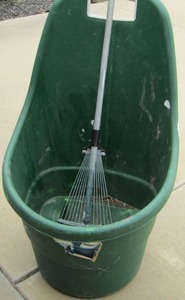 lot 698 image: Green Rubbermaid lawn cart  W GARDEN RACK