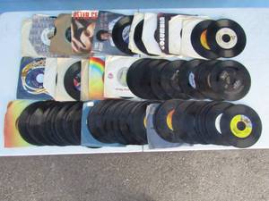 lot 10 image: Assorted 45 records, including Van Halen, Huey Lewis and the News, Weird Al Yankovic, and others