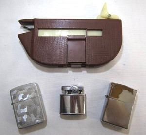 lot 30 image: Laredo filter cigarette maker circa 1970s and Zippo, Star-Lite and Storm King lighters