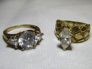 lot 35 image: 10k and 14k gold rings with precious gem stones