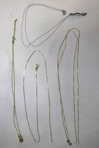 lot 39 image: Assorted necklaces, including 10K ITALY, 14K INDIA, PCDA 10K TURKEY, and more
