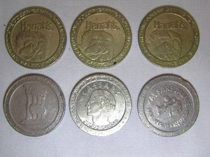 lot 50 image: Six retro casino tokens, including Harrahs, Caesars Palace, and more