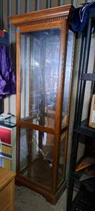 lot 24 image: Glass display cabinet, back mirror is broken