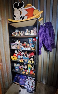 lot 51 image: Assorted Mickey Mouse and Disney memorabilia, including rocking Mickey Mouse, Mickey and Minnie Mouse figurines, Mickey Mouse jacket, and more