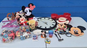 lot 68 image: Assorted Mickey Mouse memorabilia, including Mickey Mouse clock, cup, Christmas ornaments and more