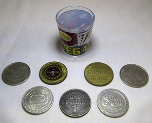 lot 86 image: 7 retro casino tokens, including Luxor, Golden Nugget and Silver City, and Las Vegas shot glass