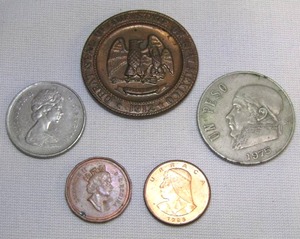 lot 96 image: 4 foreign coins, including Panama, Mexico, and Canada, and 1 collectible 1912 Seal of New Mexico coin
