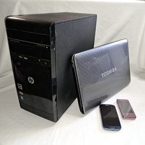 lot 130 image: HP Pavilion P2-1122 desktop computer, Toshiba Satellite L755 laptop, Samsung Galaxy S3 cell phone and Samsung Instinct cell phone